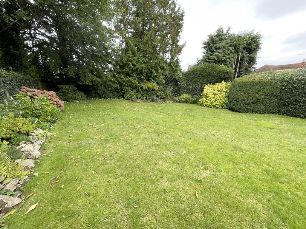 Lot: 97 - DETACHED CHARACTER PROPERTY IN POPULAR COMMUTER VILLAGE - Rear garden from patio area